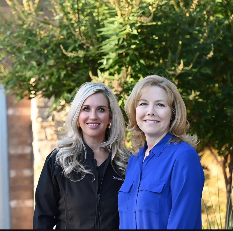 Dr. Traci King and Dr. Susan Payne together outside