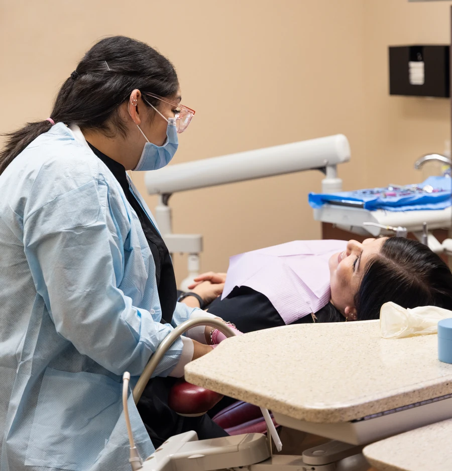 A Payne & King team member providing chairside care